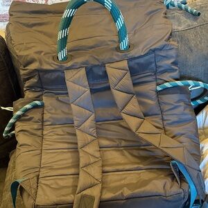 lululemon athletica brown backpack with teal rope handles